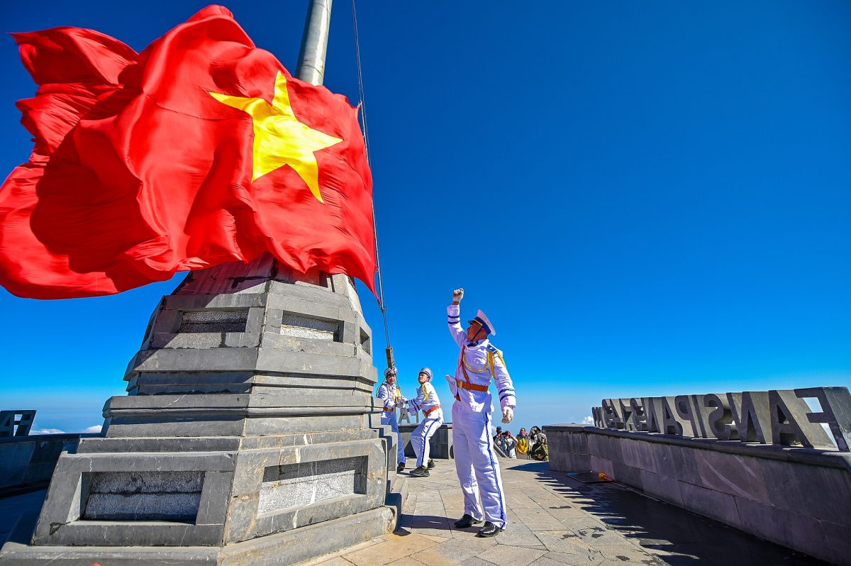 Fansipan Summit flag raising ceremony 3143m Sa Pa Lao Cai Vietnam